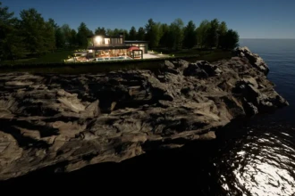 night view of cliff side home