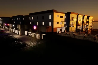 evening rendering of condo building